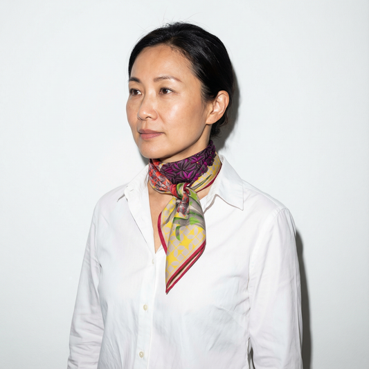 Model wearing Solfatara + Mimosa silk scarf as neck wrap by Leeloo + Zohan