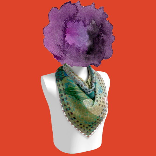 J. H. Twachtman silk scarf tied on mannequin bust on orange background by Leeloo + Zohan