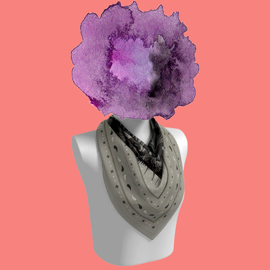 Le Chat Zohan silk scarf tied on mannequin bust on pink background by Leeloo + Zohan