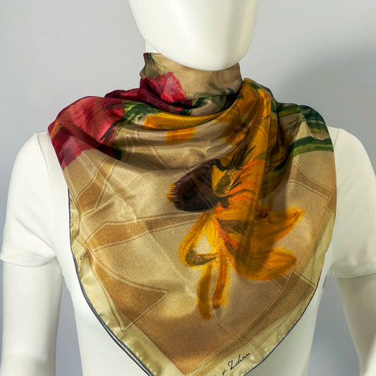 On The Plains & Chicago silk scarf tied at the neck — shown on form.—Square Scarf