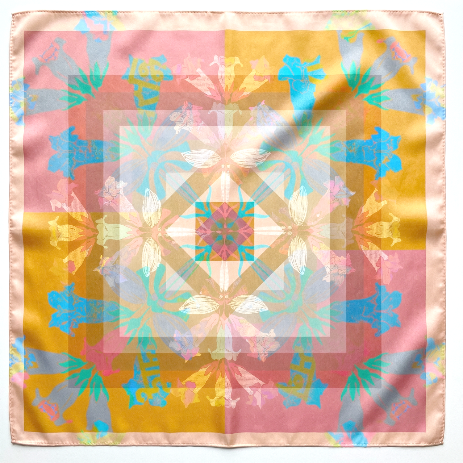 A vibrant silk scarf from the American Folk Art Series showcasing intricate floral designs and bold colors, handcrafted with 100% silk habotai.