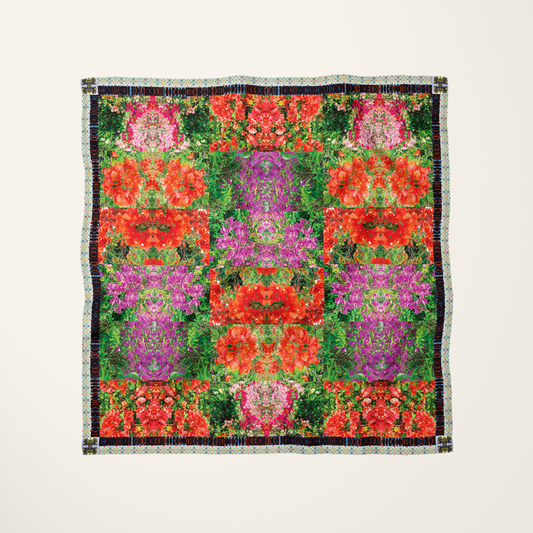 Makena Bloom silk scarf—tropical Maui floral photograph at full bleed, flat-lay product shot