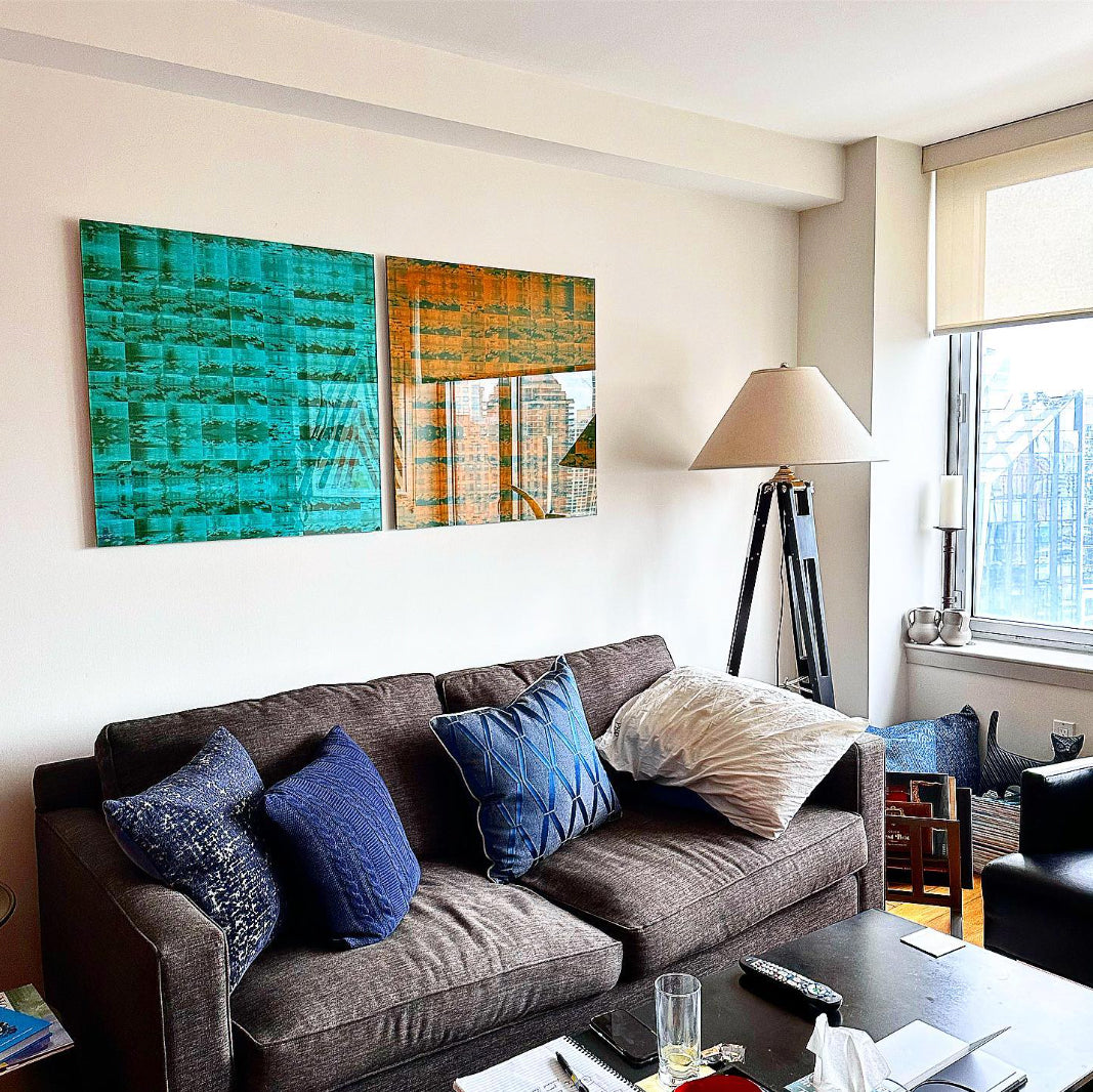 Diptych of teal and orange photographic pattern works by Paul Morris in a Manhattan apartment