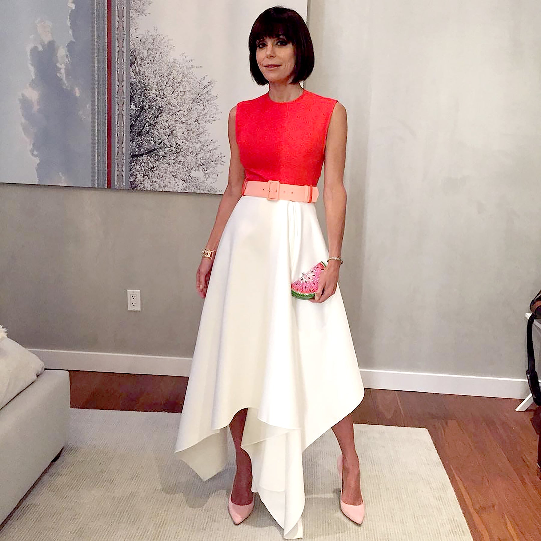 Bethenny Frankel at home with two photographic works by Paul Morris—a cloud study and a flowering tree