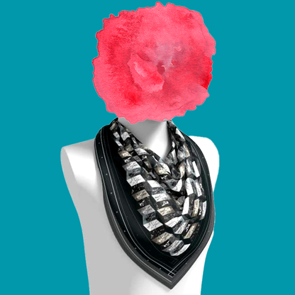 David Michelangelo silk scarf draped on mannequin bust showing Renaissance art geometric pattern by Leeloo + Zohan