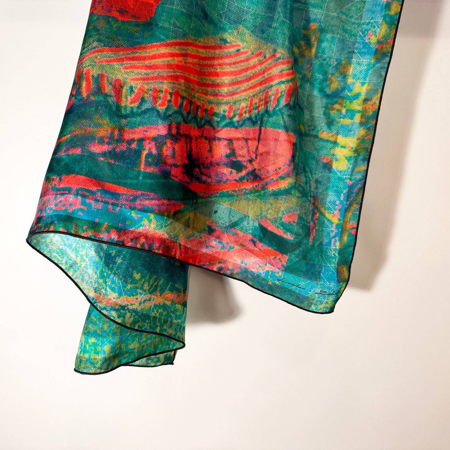 Loeb Boathouse silk scarf hanging in soft folds showing the teal Central Park print by Leeloo + Zohan