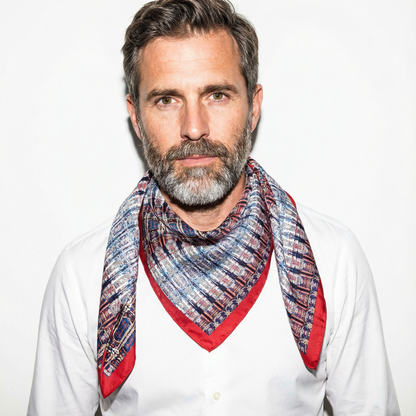 Model wearing Red Hook, Brooklyn silk scarf as neck wrap with urban warehouse pattern by Leeloo + Zohan