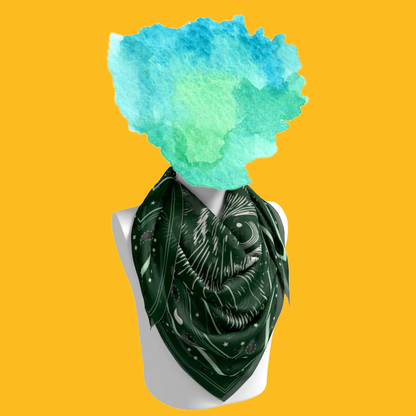 Le Chat Leeloo silk scarf tied on mannequin bust on yellow background by Leeloo + Zohan