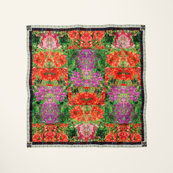 Makena Bloom silk scarf—tropical Maui floral photograph at full bleed, flat-lay product shot