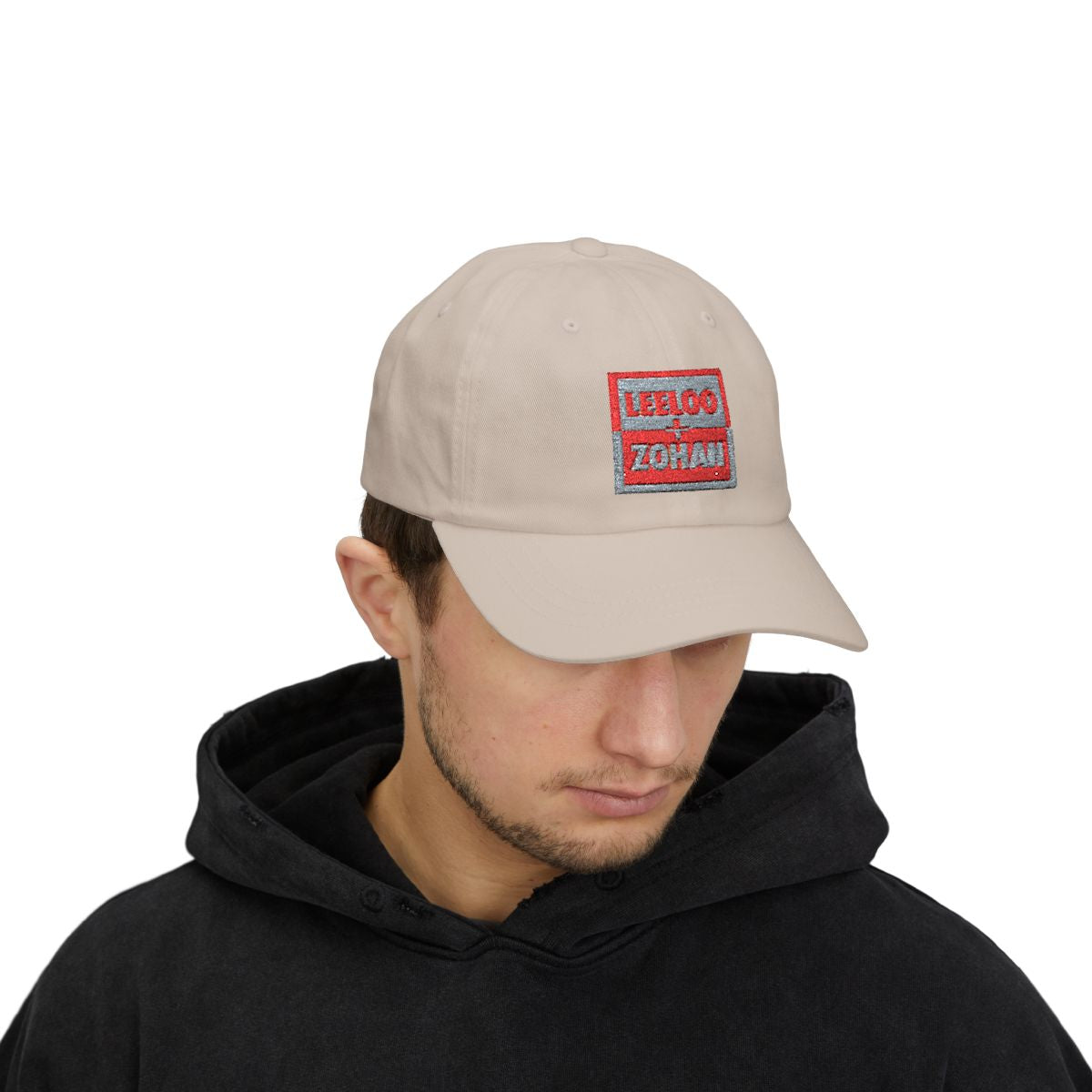 Model wearing Leeloo + Zohan Classic Dad Cap in khaki with embroidered logo patch by Leeloo + Zohan—Hats