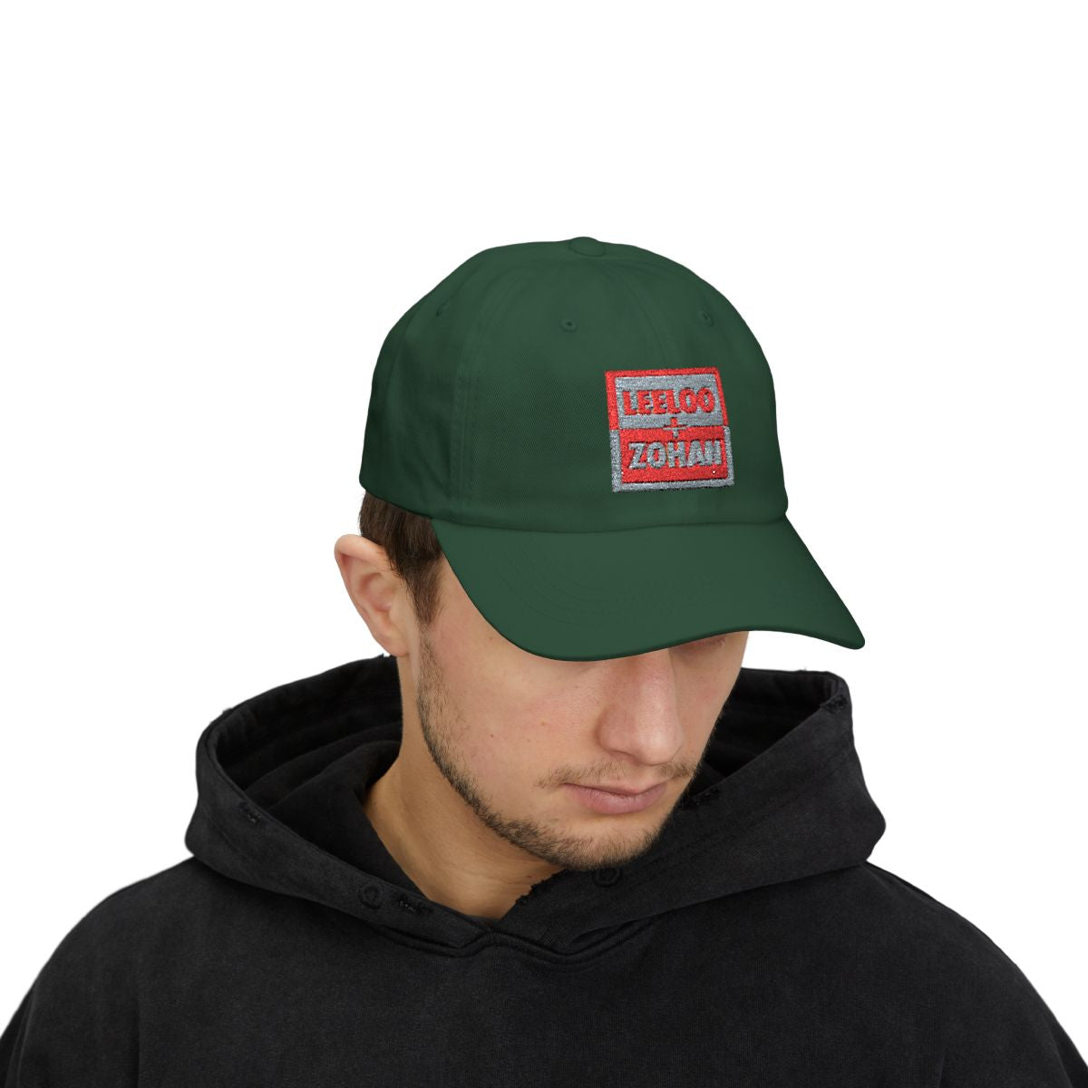 Model wearing Leeloo + Zohan Classic Dad Cap in forest green with embroidered logo patch by Leeloo + Zohan—Hats