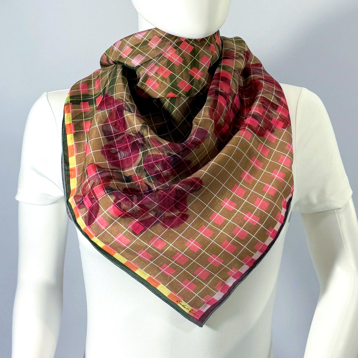 Flowers from The Mesa silk scarf (shown on form, 36") — draped styling detail.