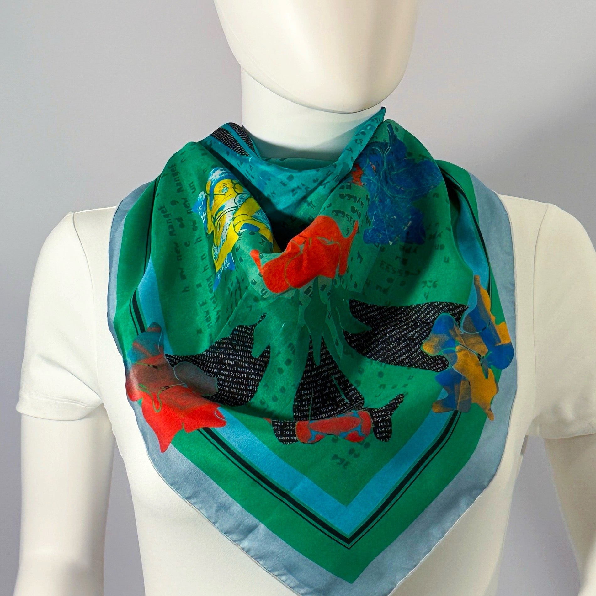 American Folk Art, Jade silk scarf tied at the neck — shown on form.—Square Scarf