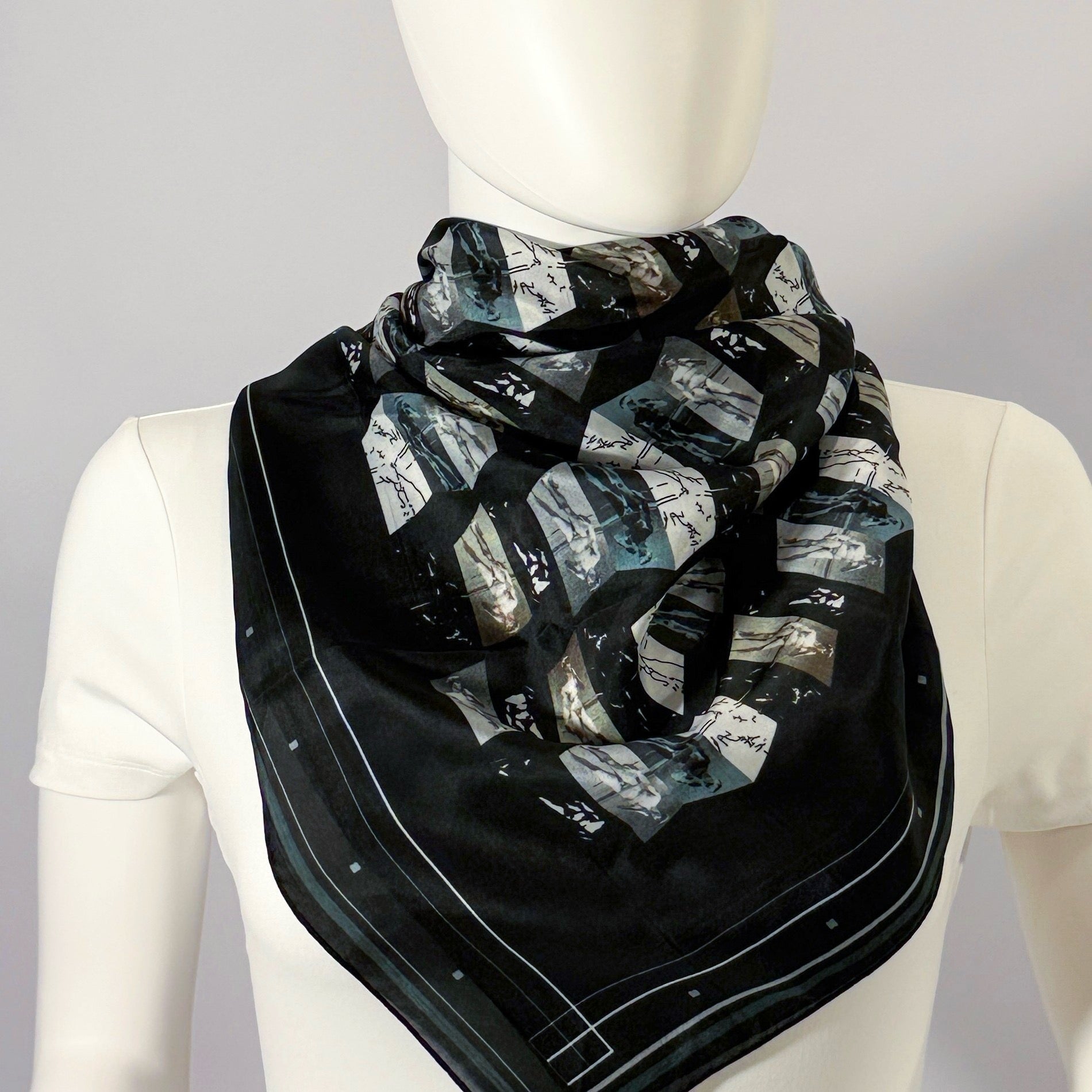 David Michelangelo silk scarf tied at the neck — shown on form.—Square Scarf