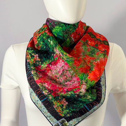 Makena Bloom silk scarf tied at the neck — shown on form.