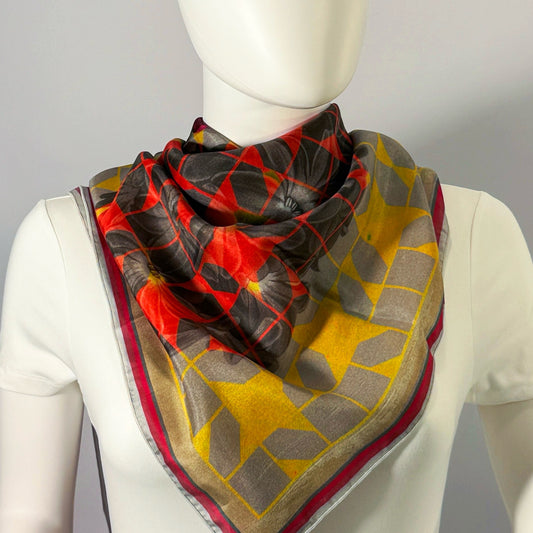 Solfatara + Mimosa silk scarf tied at the neck — shown on form.—Square Scarf