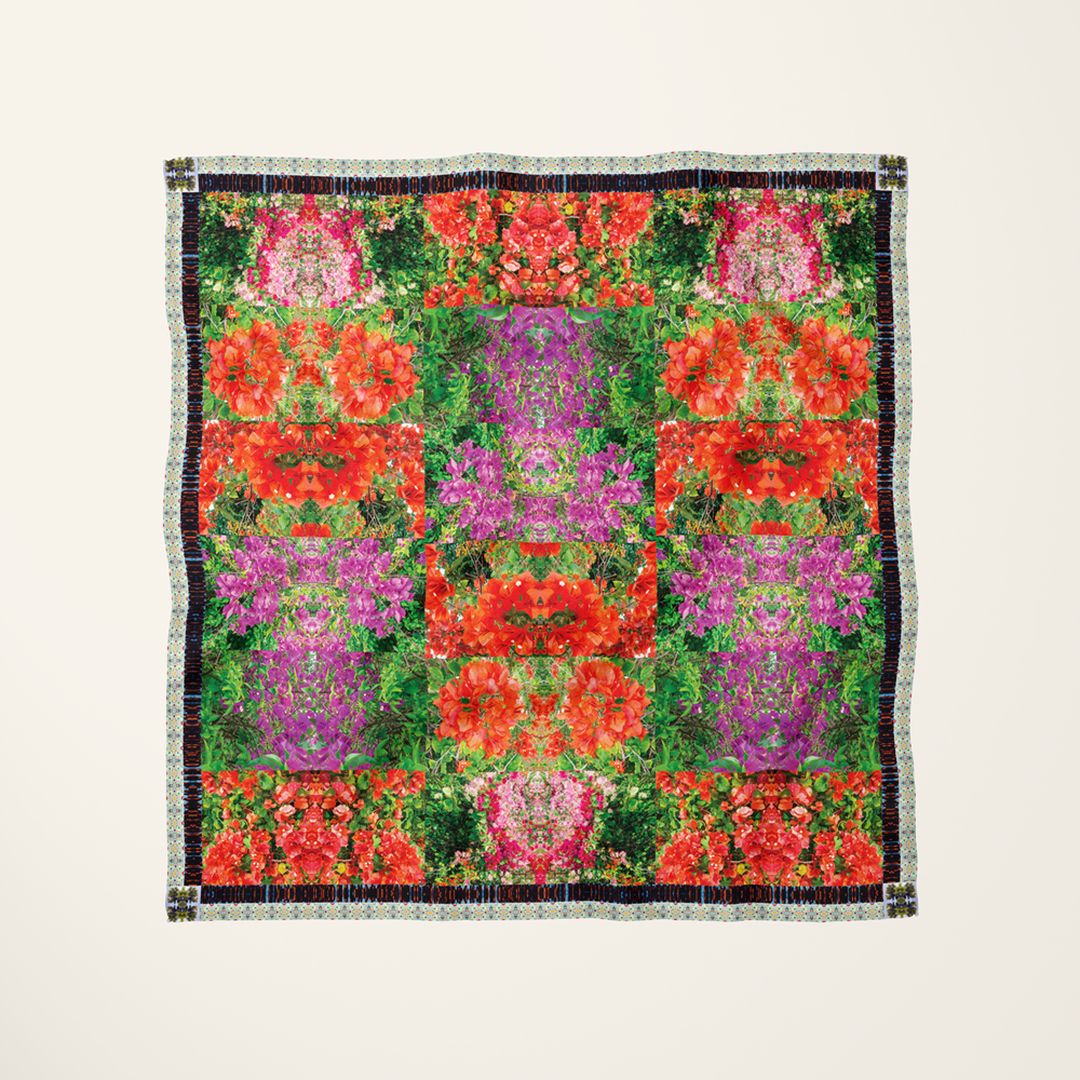 Makena Bloom silk scarf—tropical Maui floral photograph at full bleed, flat-lay product shot